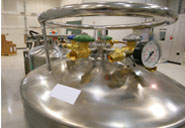Large metal container with valves