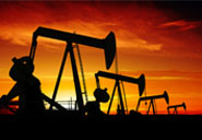 Oil rigs at sunset